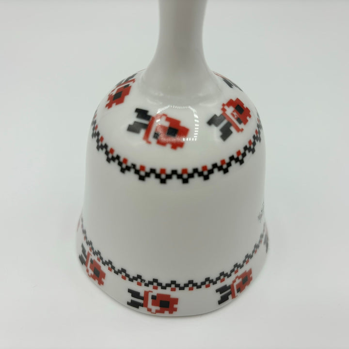 Ceramic bell in white, red and black