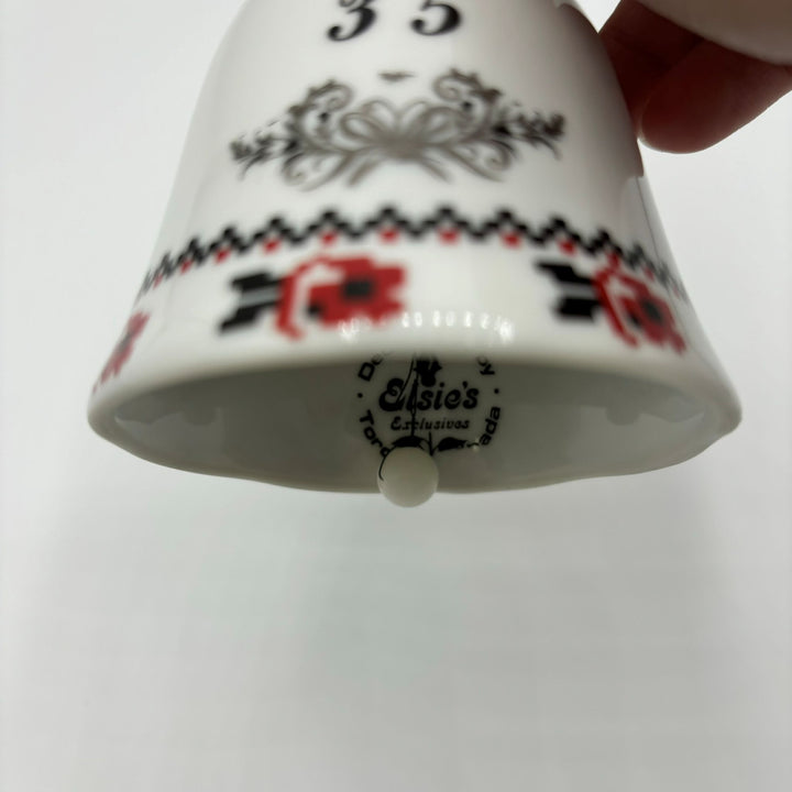 Ceramic bell in white, red and black