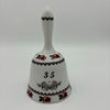 Ceramic bell in white, red and black